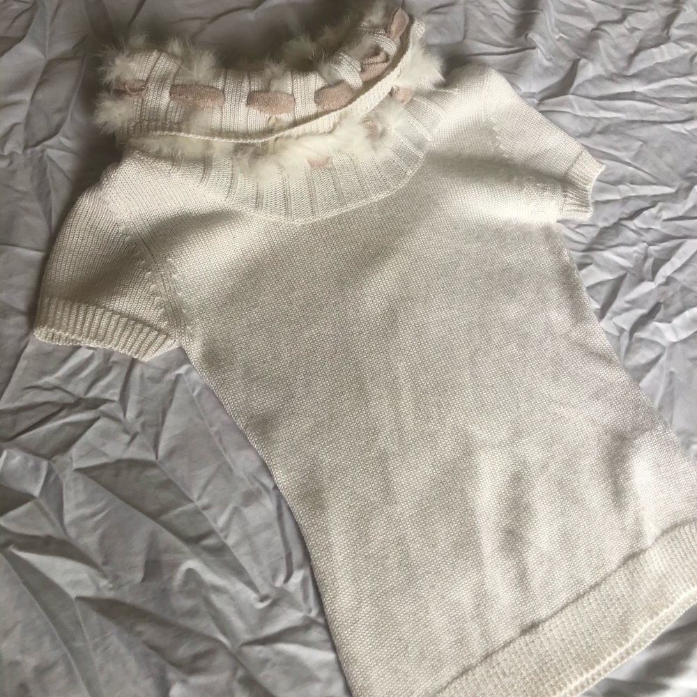 Super cute white sweater with a furry collar